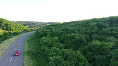 Red Car Driving on Country Road, Aerial View
