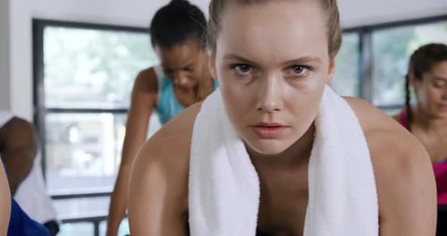 Working out on exercise bikes at a gym