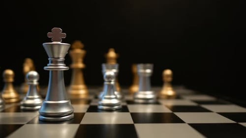 Chess Pieces Arranged on Black and Gray Checkered Board