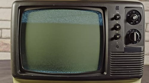 Vintage Television Displaying Static and Noise