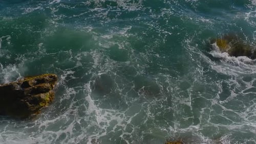 Ocean Waves Roll in on the Peaceful Shore on Tropical Island