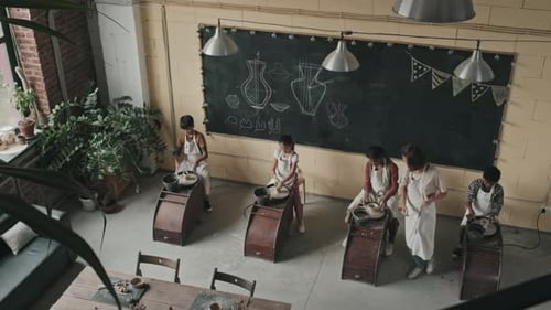 Students Learn Pottery Making in Art Studio Workshop