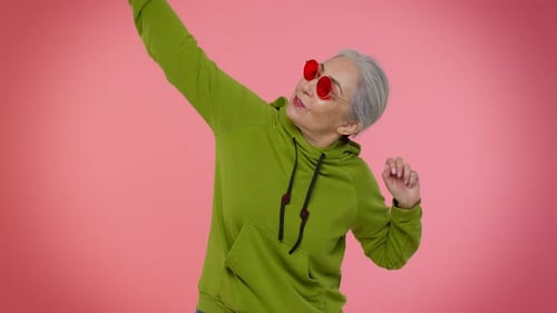 Senior Woman Listening Music Dancing Disco Fooling Around Having Fun Expressive Gesticulating Hands