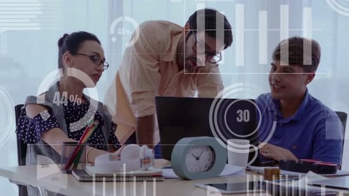 Colleagues Work Together on a Project in Office