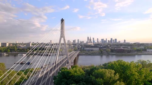 Aerial View of the Warsaw Cable Bridge in the Sunset with City on the Background