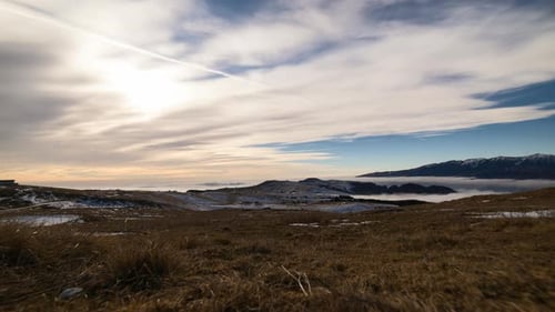 Winter Mountain Landscape with Cloudy Valley View