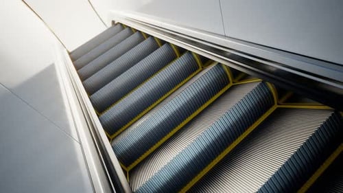 Modern escalator made of steel. Moving stairs. Passage. Way of transportation.