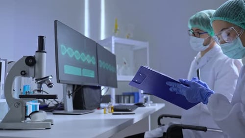 Medical Professionals Analyzing Data in a Bright Lab