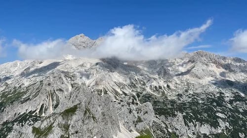Majestic Mountain Range Under a Blue Sky