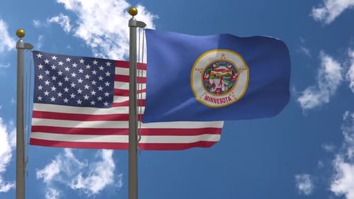 Waving American and Minnesota State Flags on a Clear Day