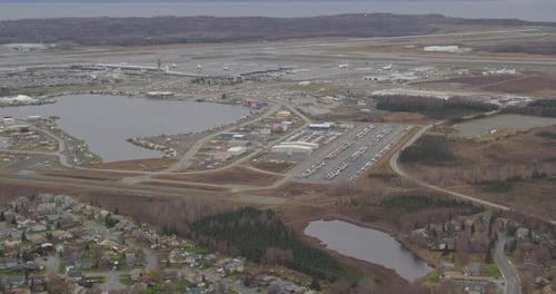 Helicopter aerial shot of industrial harbor, night