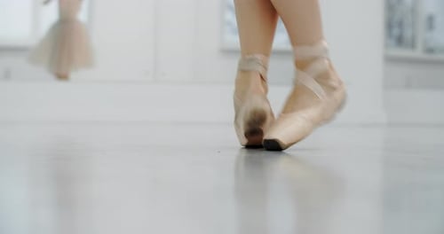 Ballet Dancer's Feet in Pointe Shoes Performing