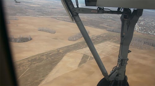 Aerial View of Rural Fields From Airplane Window