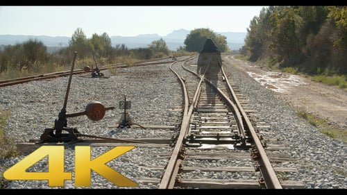 Man Walks By The Railroad And Fades Away 01