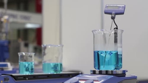 Liquid Being Mixed in Beaker in Lab