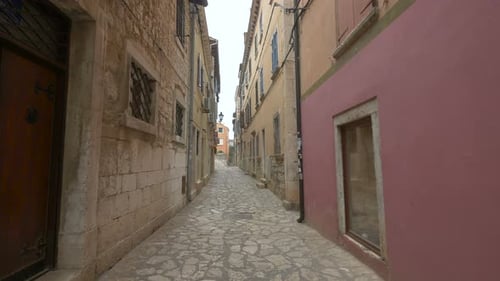 Paved street with old houses