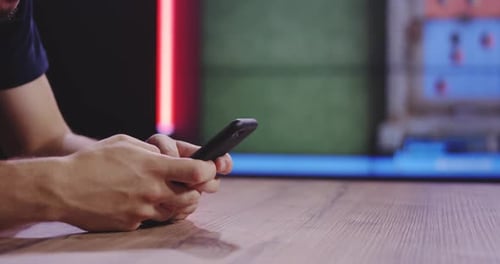 Man Playing Mobile Game