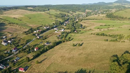 Landscape with Mountains Green Fields and Countryside Village Aerial View