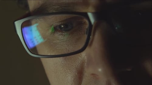 Close Up of Eye with Computer Screen Reflection