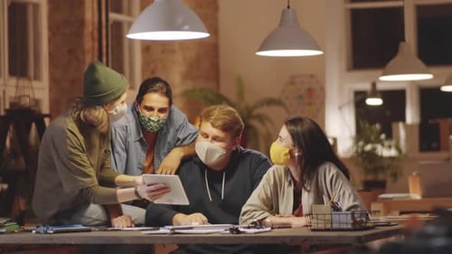 Portrait of Young Business Team in Face Masks in Modern Loft Office