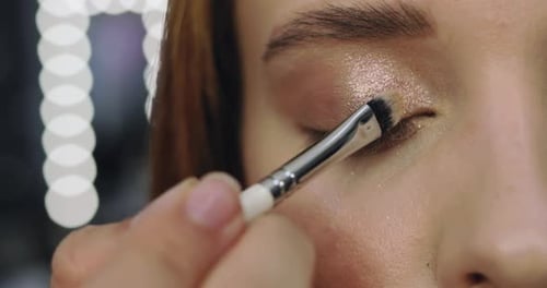 Closeup of Perfect Nude Makeup Process for Young Female Model