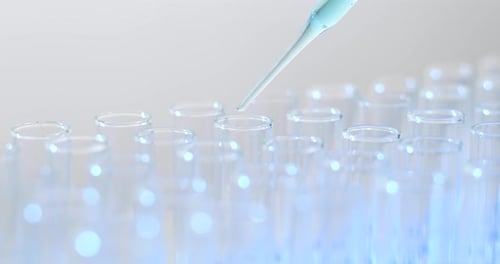 Close Up of Test Tubes with Blue Liquid