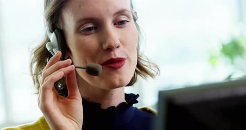 Female customer service executive working in call center