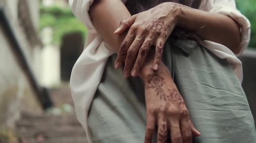 Young Adult Woman with Henna Tattoo on Hands
