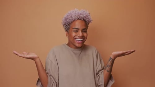 Smiling Young Woman With Arms Outstretched