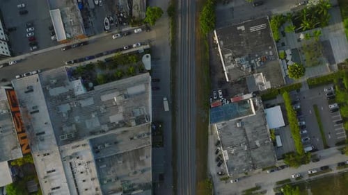 High Angle View of Double Tracks Railway Line Leading Through Town