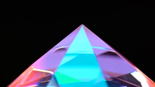 Pointed End of the Diamond Turns and Shimmers. Black Background