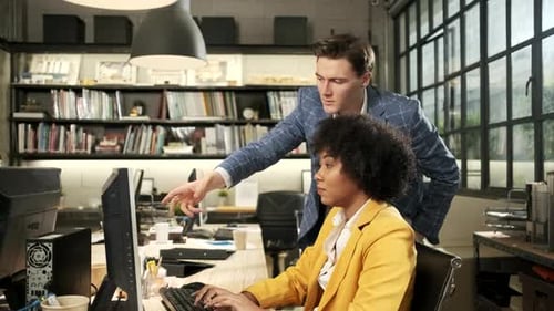 Two workers and colleagues discussed business jobs in workspace office company.