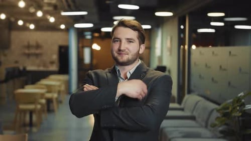 Close Up Portrait of a Successful Businessman with a Beard of Caucasian Appearance