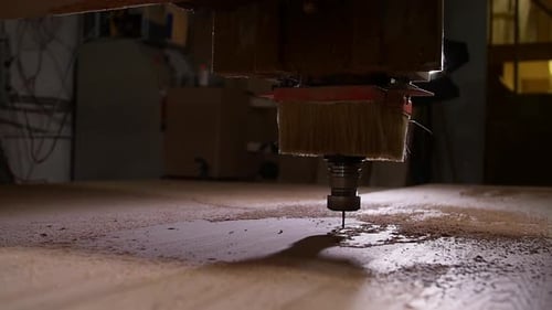 CNC Machine Drilling Into Wood Material