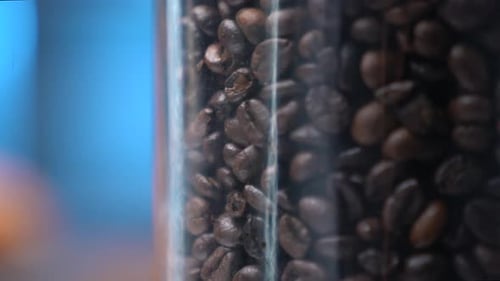 Close Up of Coffee Beans in a Glass Jar