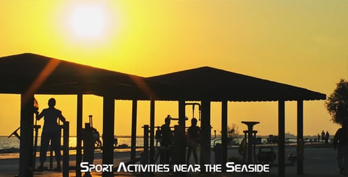 People Exercising at Outdoor Gym During Sunset