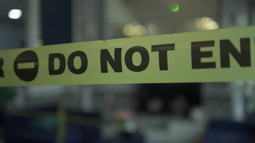 Close-up of Caution Tape: Do Not Enter