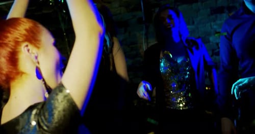 Foxy Hair Girl Dancing at a Nightclub