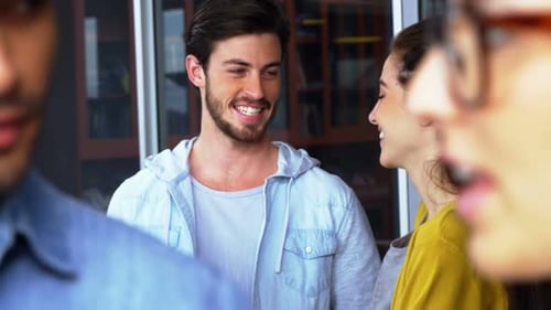 Team of Young Adults in Modern Office