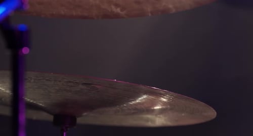 Close Up of Drum Cymbal Performance With Water