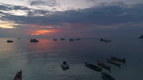 Beach At Sunset with Boats