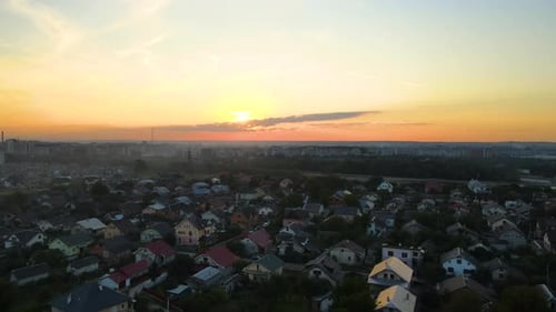 Aerial View of Residential Houses in Suburban Rural Area at Sunset
