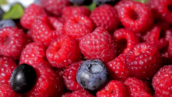 Close Up Rotation Loopable Raspberry. Fresh, Juicy Raspberry Background ...