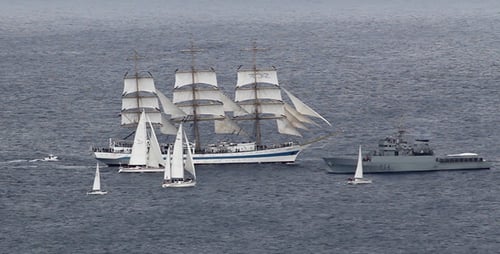 Sailing Ships and Naval Vessels on Open Water