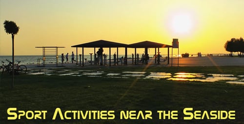 Adults Exercising at Beach Park During Golden Hour