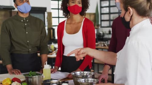 Chef Instructing Food Preparation Class During Pandemic
