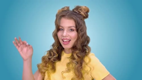 Young Woman Makes OK Gesture on Chroma Key