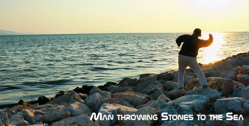 Man Throwing Stones to the Sea
