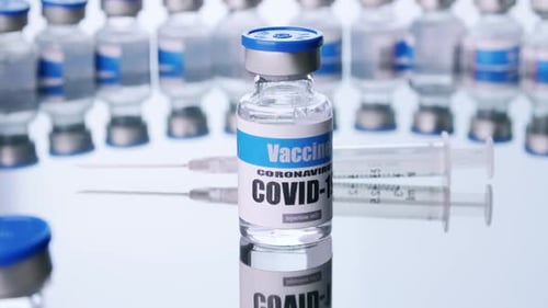 Coronavirus Vaccine Vial and Syringes