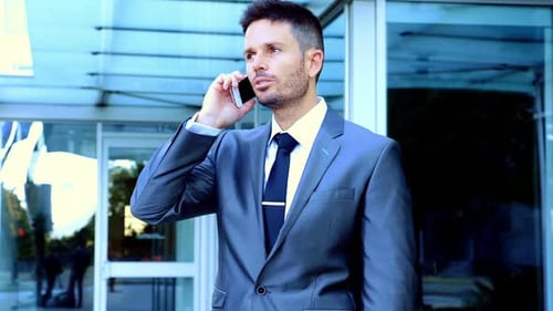 Businessman talking on mobile phone
